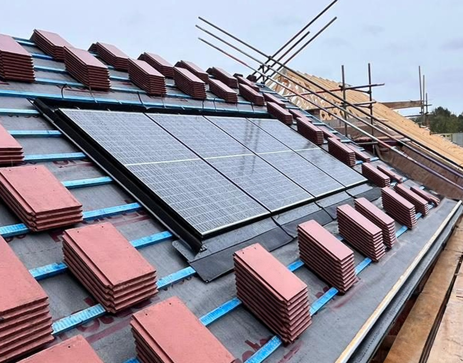 Roof Image tiles on a roof ready to be put in place and solar panels installed
